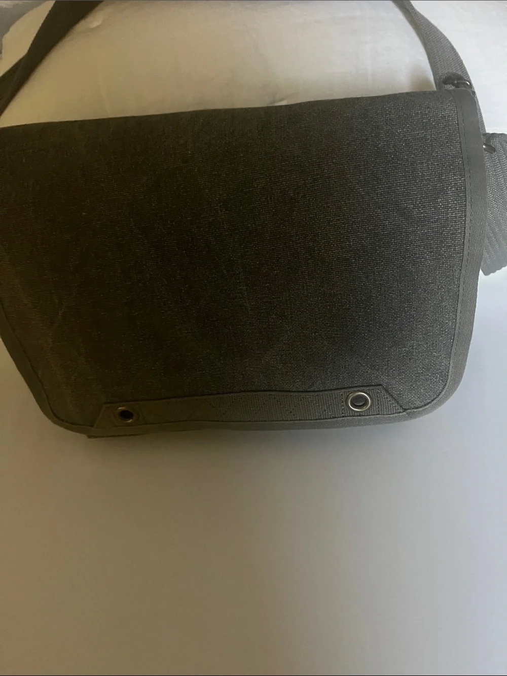 Gray Canvas Think Tink Camera Bag with Adjustable Strap.
